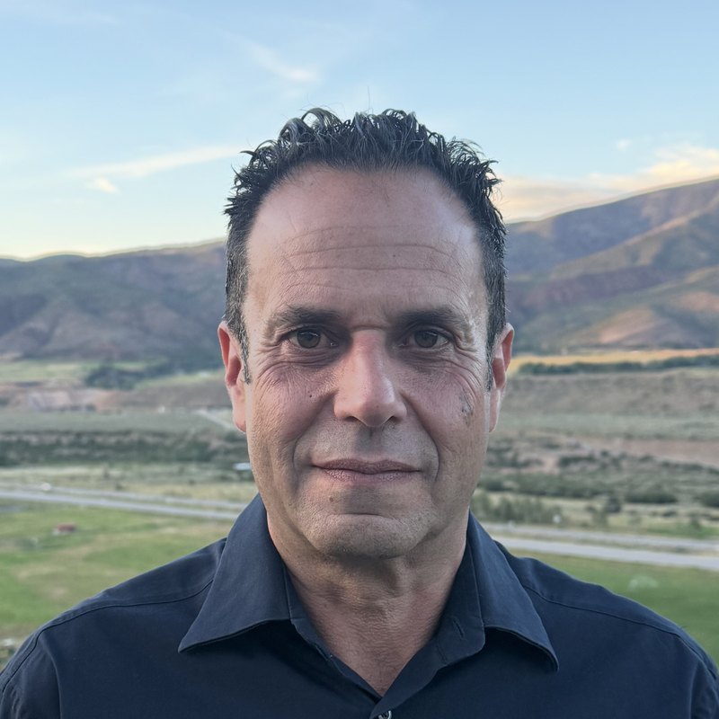 Michael Gurtman, CEO of Sourced Pantry, with the Roaring Fork Valley behind him